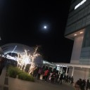 満月の夜空にかかった虹