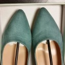 買う